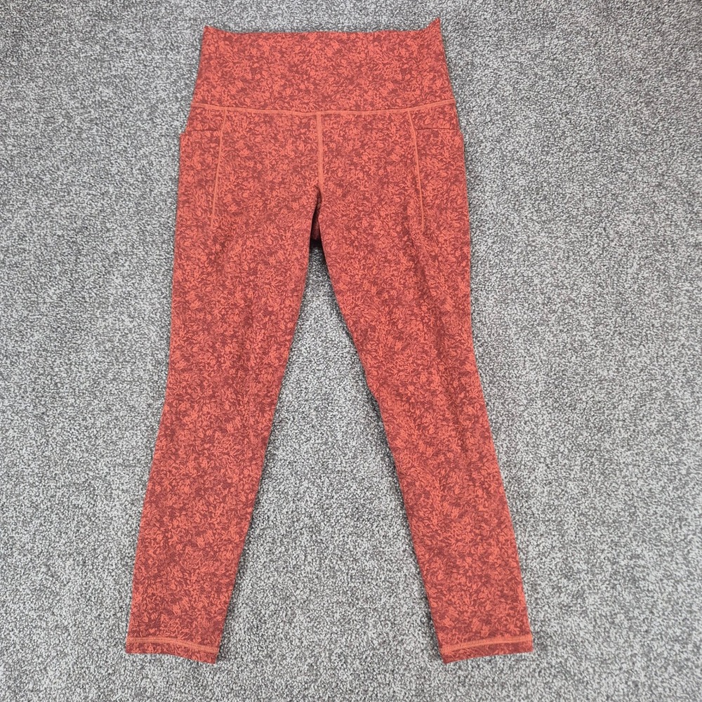 Athleta Salutation Stash Pocket II 7/8 Tight Womens Small Orange Textured